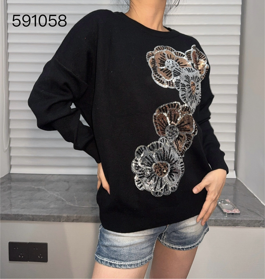 Women's fashion beaded long-sleev sweater.