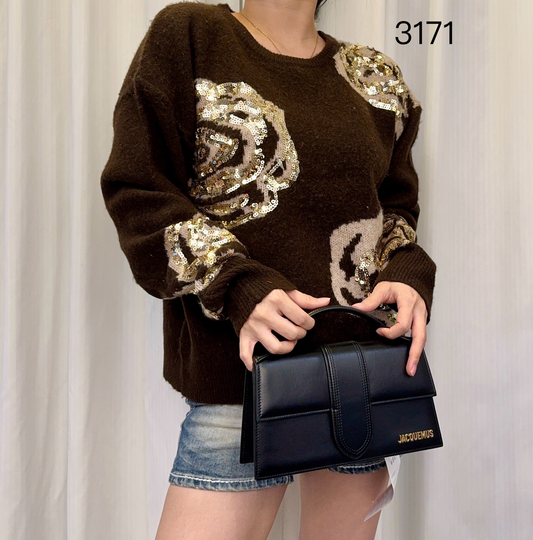 Women's fashion beaded long-sleev sweater.